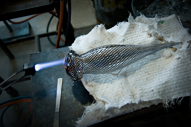 One of the 1000 glass forms being finished in the studio - production of Transition II