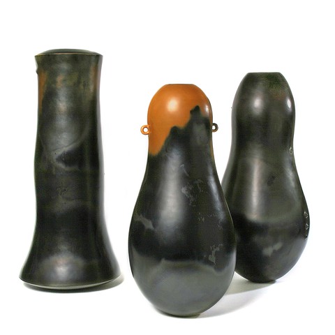 Left: Vessel; Series III, no. 1 2005/06. 24 1/2 x 10 1/2 in. (62.5 x 27 cm.) Middle: Vessel Series III, no. 3 2005/06. 20 1/8 x 9 1/2 in. (51.2 x 24 cm.) Right: see second image for details. All red clay, carbonized and multi-fired. 