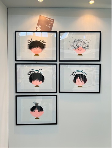 The set of artwork from "My First Haircut' exhibit at Bologna Children's book Fair In Italy